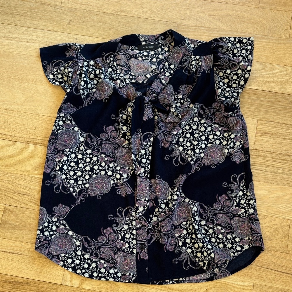 Women’s tie neck blouse.  Paisley floral.  Pit to pit measurement is 21”.